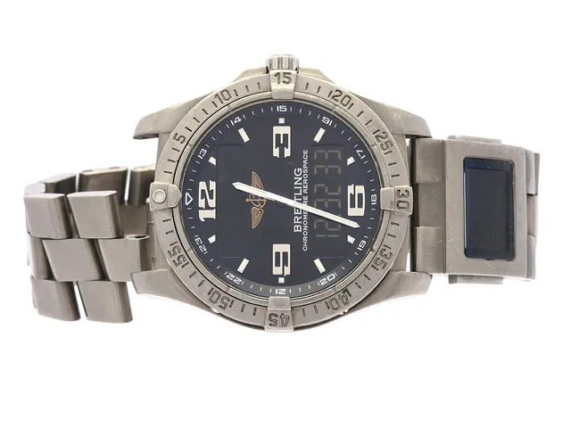 BREITLING, Aerospace, Chronometre, Cal 79, Verk nr. 1262384, Serie nr. 1048940, Ref nr. E79362, Boett nr. 1307 B5, herrur, 42 mm, analog/digital, titan, quartz, safirglas (repa), utbytesverk (Breitling), defekt, defekt klickring, Co-Pilot, Serie nr. 1808, Ref nr. E80172, Boett nr. 0307 B5, titan, quartz, defekt, Professionallänk II (saknar ändfäste), cert, mars 2008, box (ej tidsenli), yk.
