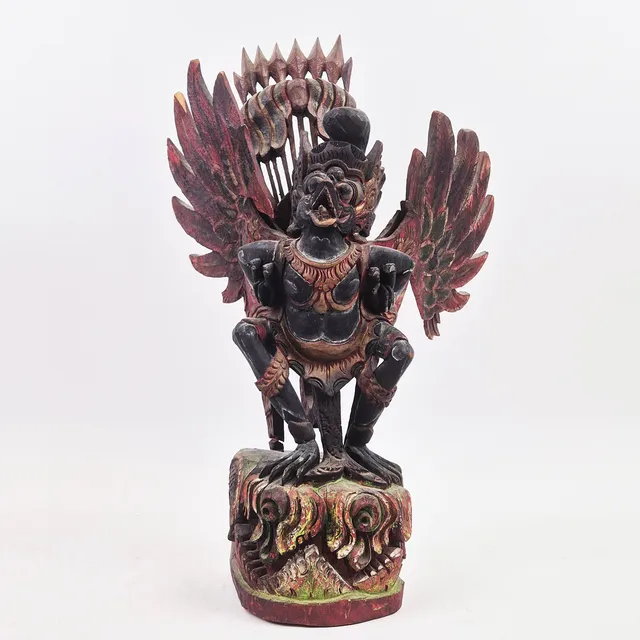 A BALINESE GARUDU CARVING.