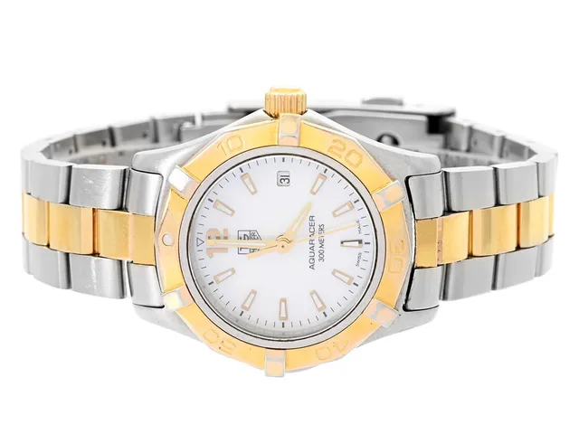 TAG HEUER, Aquaracer (300 Meters), Serie nr. RUN6595, Ref nr. WAF1424.BB0825, Boett nr. WAF1424, damur, 27 mm, bicolour, quartz, safirglas (repor/nagg), datum, pärlemorurtavla, skadad urtavla, originallänk, viklås, Ref nr. FAB015-G-Y1/3112 G, längd 165 mm, ca 2010.