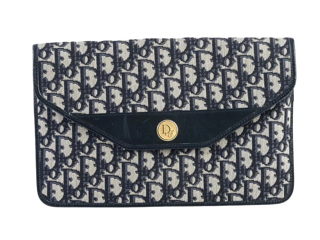 CLUTCH, CHRISTIAN DIOR, vintage, monogram oblique, mörkblått läder, guldfärgade beslag, 29x18 cm, — Accessoarer/Väskor — Kaplans