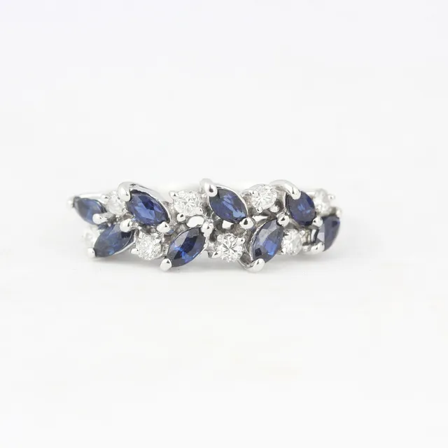 PLATINUM SAPPHIRE AND DIAMOND RING.