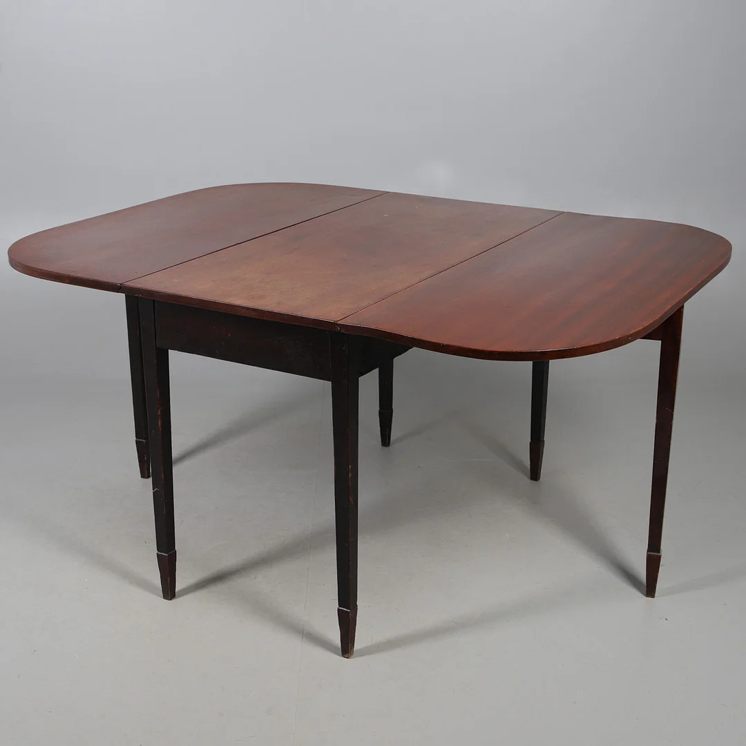 A MAHOGANY DROP LEAF DINING TABLE. — Dining tables — Lawrences Auctioneers