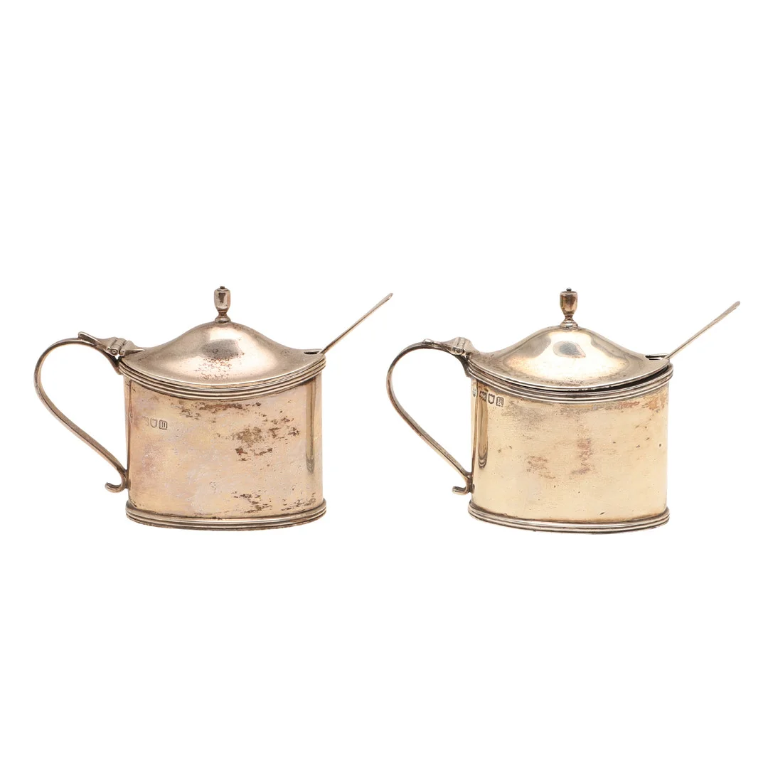 A PAIR OF EDWARDIAN SILVER MUSTARD POTS AND SPOONS. — Silver — Lawrences Auctioneers