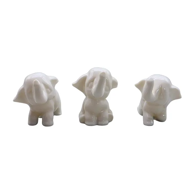 ELEFANTEN-TRIO AUS PORZELLAN.