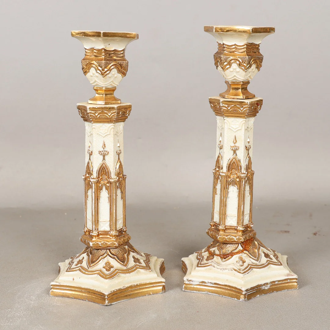 A PAIR OF MEISSEN GOTHIC STYLE PORCELAIN CANDLESTICKS (2). — European — Bishop & Miller