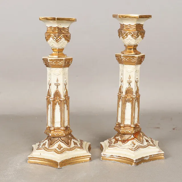 A PAIR OF MEISSEN GOTHIC STYLE PORCELAIN CANDLESTICKS (2).