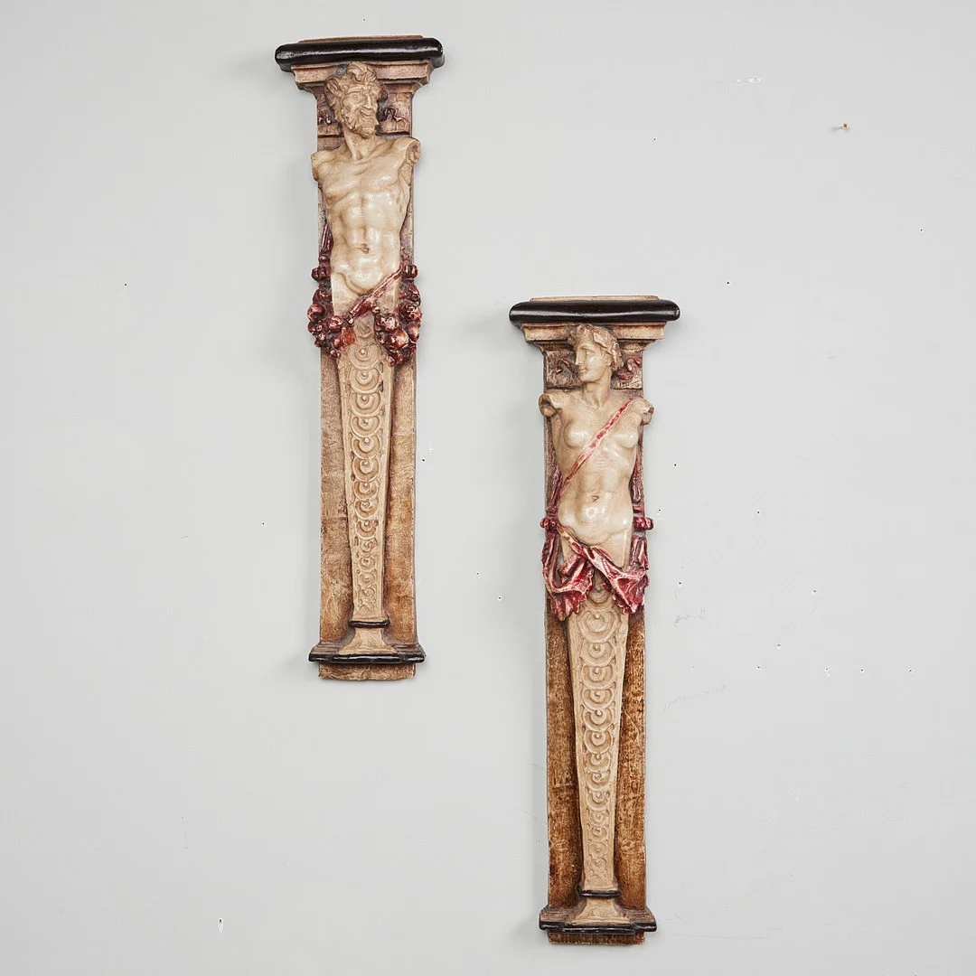 Zwei Wandobjekte / Wandpilaster mit Hermen (2). — Sculptures & Bronzes — Stockholms Auktionsverk Köln