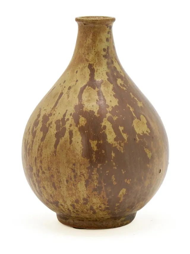Arne Bang: A small stoneware vase decorated with greenish and brown glaze. Signed monogram, 71. H. 12.5 cm.