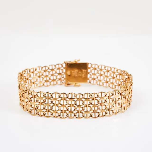 ARMBAND, 18 k guld, x-länk med stav, Ädelsmycken Aktiebolag, Stockholm, 1968.