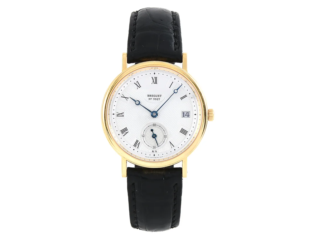 BREGUET, Classique, Cal 516/1, Verk nr. 12952, Serie nr. 3927, Ref nr. 5920BA/15/984, Boett nr. 3970 M, herrur, 34,5 mm, 18K guld, automatisk, safirglas, liten sekundvisare, datum, läderband, originalspänne i 18K guld, cert, april 2006, träbox (skadad), ytterkartong. — Klockor/Breguet — Kaplans