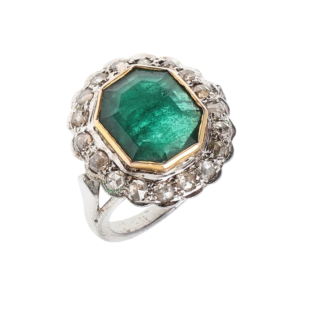 AN EMERALD AND DIAMOND CLUSTER RING. — Rings — Lawrences Auctioneers