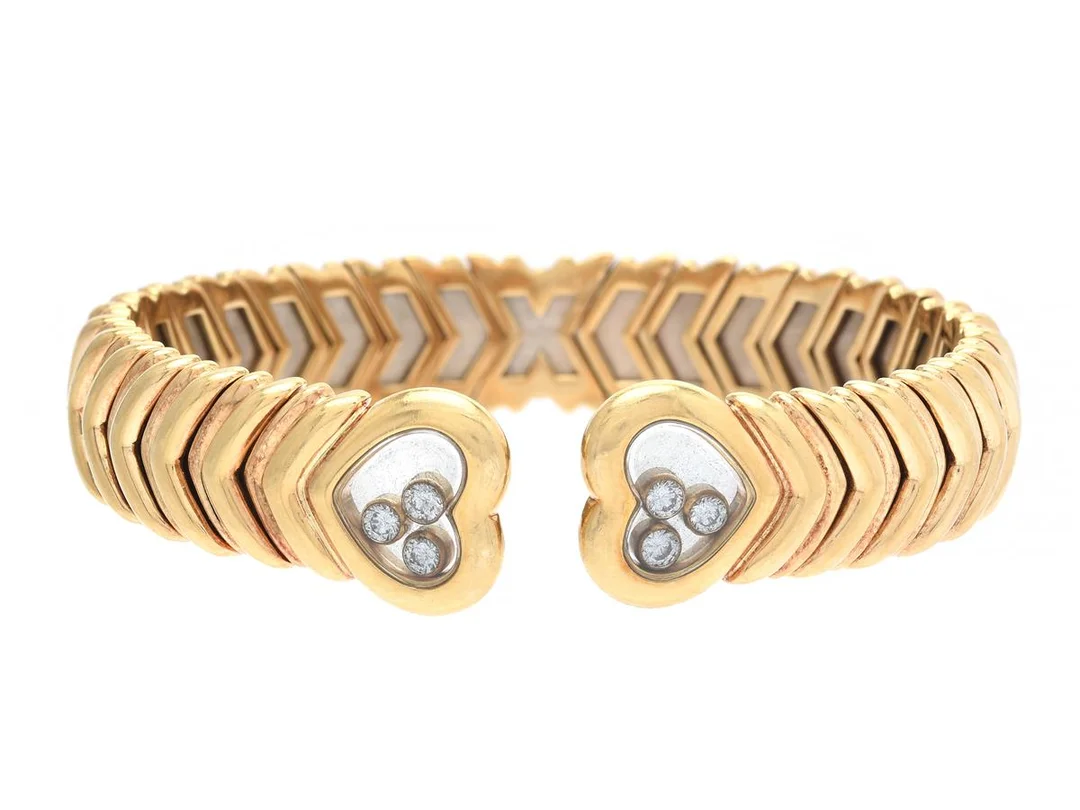 CHOPARD, armband, Happy Diamonds, 18K guld, briljantslipade diamanter ca 0,18 ctv, ca TW/VVS, stl 15, vikt 52,4 g. — Smycken/Armband — Kaplans