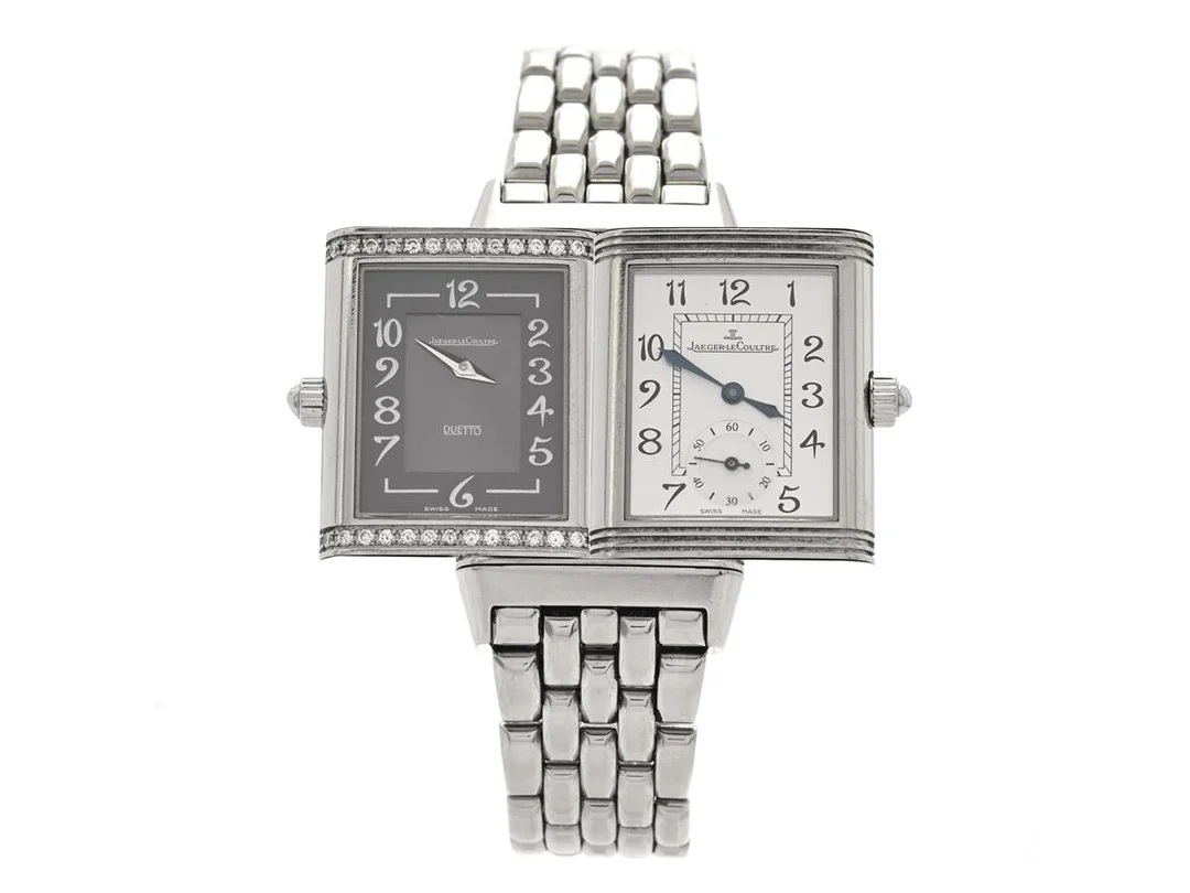 JAEGER-LE COULTRE, Reverso, Duetto Classique, Cal 865, Serie nr. 2278841, Ref nr. 256.81.01, Boett nr. 256.8.75, midsize, 23 x 33 (38,7) mm, stål, manuell, safirglas, briljanter på boetten (32 st, TW/VVS, ca 0,31 ctv), defekt (servicebov/fjäder av), originallänk, viklås, cert, februari 2006, box, ytterkartong. — Klockor/Jaeger-Le Coultre — Kaplans