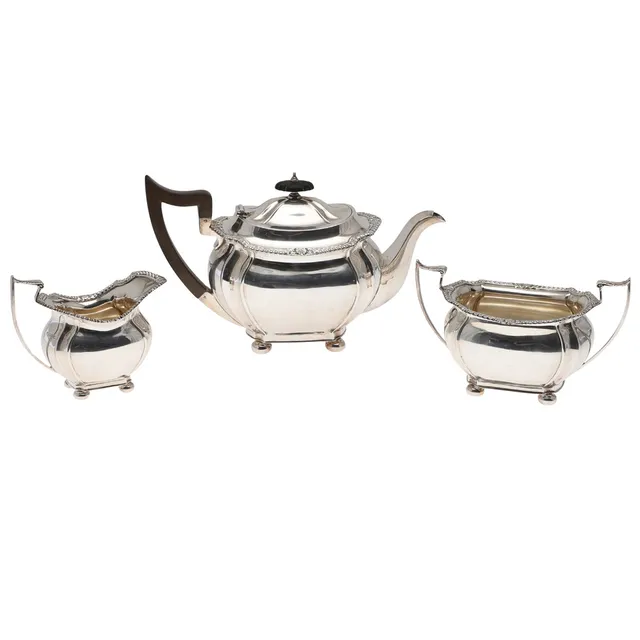 AN EARLY 20TH CENTURY SILVER THREE PIECE TEASET.