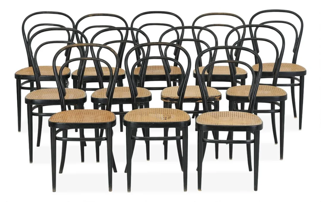 Set of 12 chairs of bentwood black-lacquered beech. Seats fitted with cane. Manufactured by Thonet, some with maker's label. (12) — Modern Furniture — Bruun Rasmussen