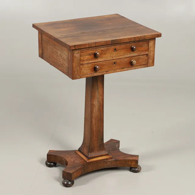 A LATE REGENCY ROSEWOOD WORK TABLE.