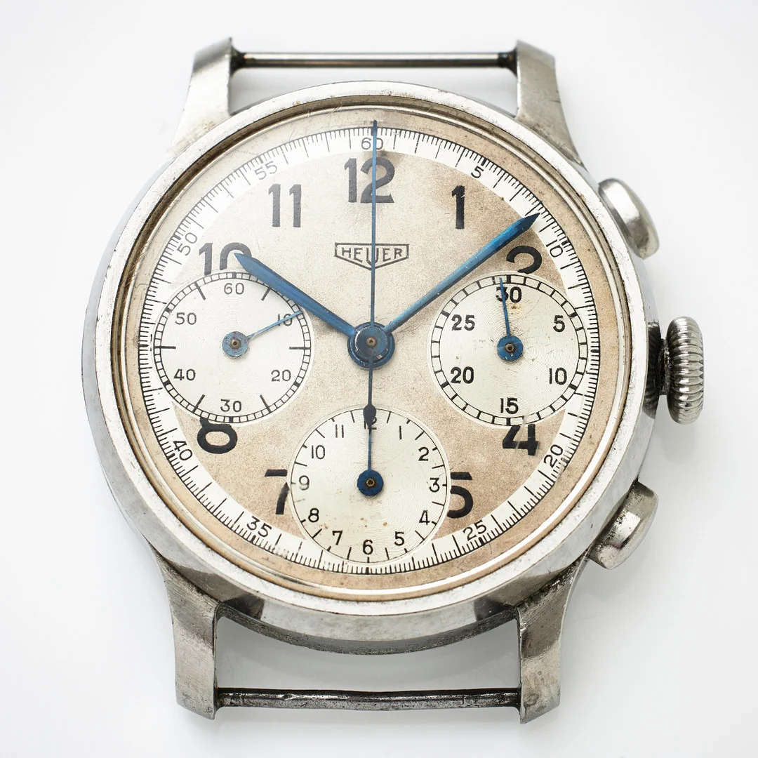 HEUER, wristwatch, steel, 1940s. — Wristwatches — Stockholms Auktionsverk Fine Art