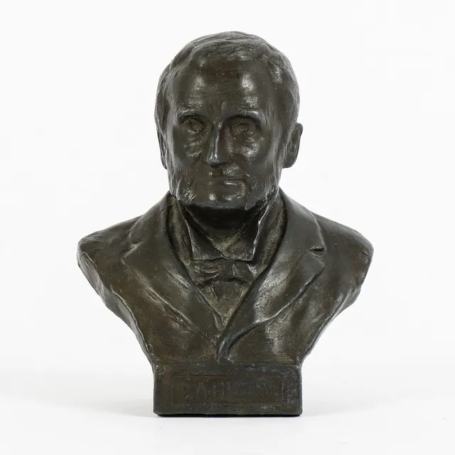 HARALD SÖRENSEN-RINGI. förställande Sven Adolf Hedin, Signerad och daterad, 1905, brons.