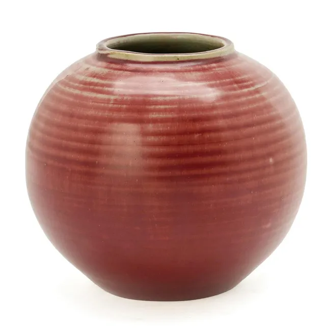 Globular stoneware vase decorated with oxblood glaze. Signed monogram. Made by Royal Copenhagen. H. 12.5 cm. Diam. 15 cm.