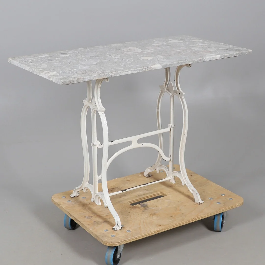 A 19TH CENTURY PAINTED CAST IRON AND FOSSILIZED MARBLE TOPPED TABLE. — Tables — Lawrences Auctioneers