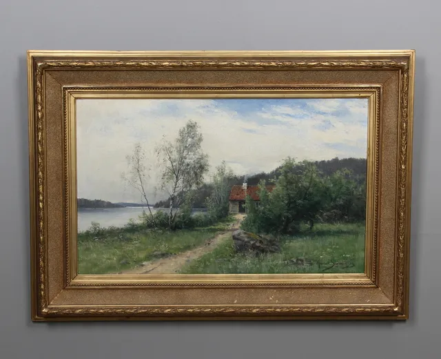 KONRAD SIMONSSON. Sommarlandskap med stuga vid sjö, olja på duk, signerad.