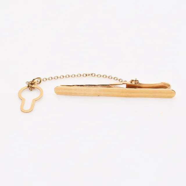 SLIPSNÅL, guld 18K, vikt ca. 4,5 gram.