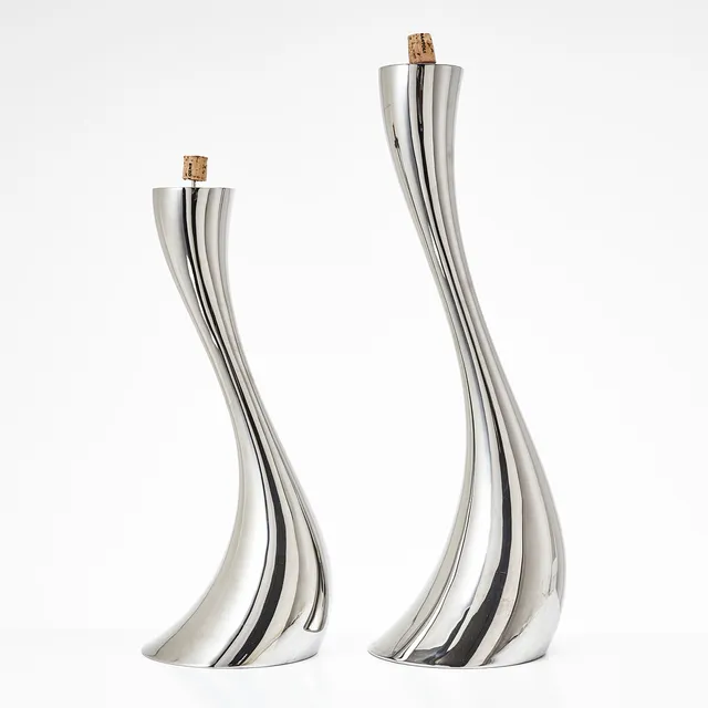 CONSTANTIN WORTMANN. Ljusstakar, 2 st, "Cobra", för Georg Jensen, samtida.