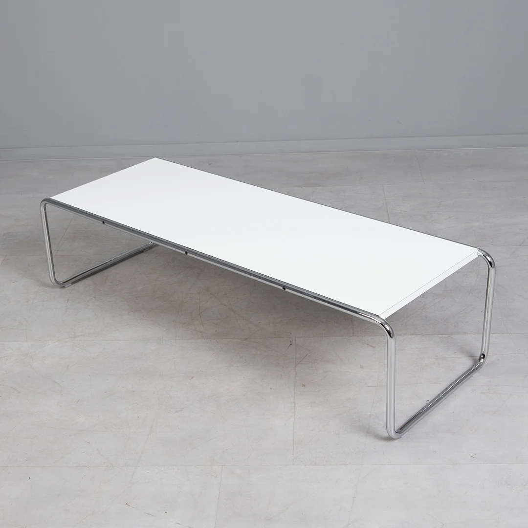 MARCEL BREUER. für Knoll International, Couchtisch / Tisch, Modell 'Lacchio 2', Rundrohrstahl, Laminat. — Tables — Stockholms Auktionsverk Köln