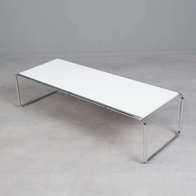 MARCEL BREUER. für Knoll International, Couchtisch / Tisch, Modell 'Lacchio 2', Rundrohrstahl, Laminat.