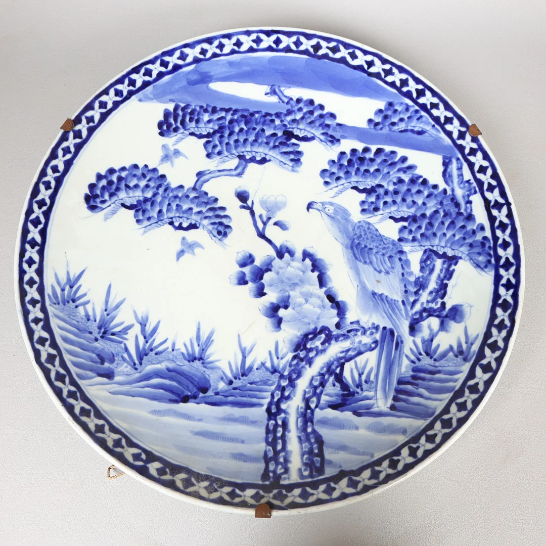 AN EARLY 20TH CENTURY LARGE JAPANESE PORCELAIN CHARGER. — Asiatica — Bishop & Miller