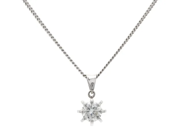 HÄNGE/KEDJA, 18K vitguld, briljant ca 0,62 ct, ca W(H)/VS1, längd 42 cm, vikt 4,7 g.