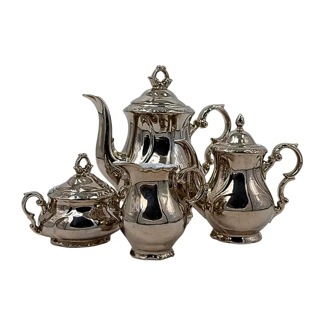 VERSILBERTES PORZELLAN-KAFFEESERVICE DER PORZELLANFABRIK GAREIS, KÜHNL & CO.