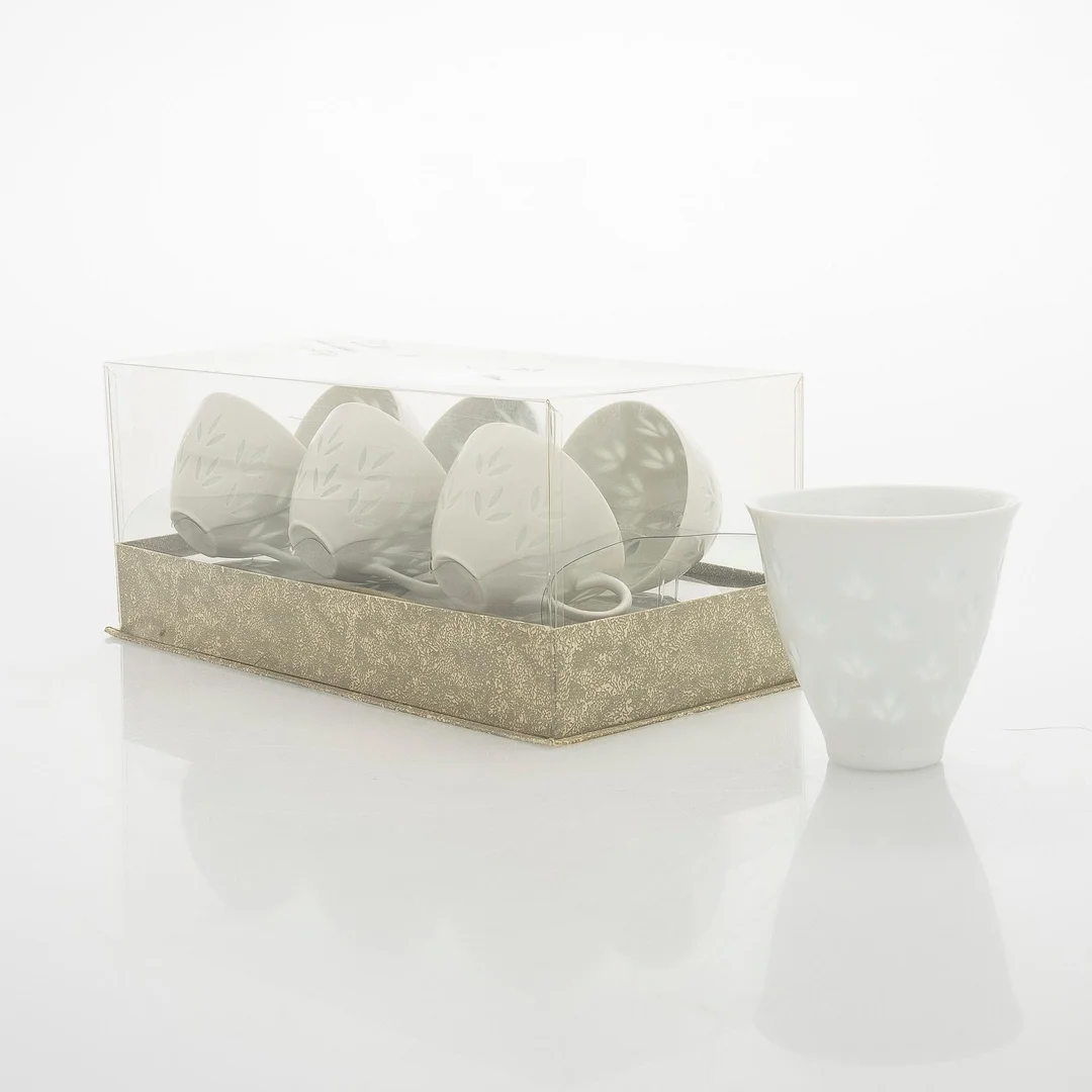 Friedl Holzer-Kjellberg, espressokoppar med fat, 6 st, samt sockerskål, risporslin, signerat i godset F.H.Kj Arabia Finland. — Design/Keramik — Bukowskis