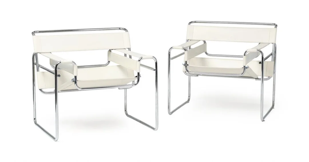 “Wassily Chair”. A pair of chromed steel easy chairs, with white leather. Designed 1925. Manufactured and marked by Fasem, Italy. (2) — Modern Furniture — Bruun Rasmussen