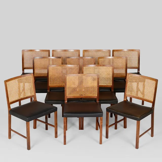 BERNT PEDERSEN. Set of 12 rosewood chairs with cane webbing. 1960s. Wørtz cabinetmakers. Denmark (12).