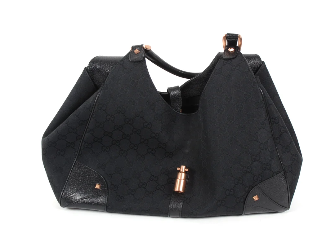 VÄSKA, GUCCI Svart gg tyg/läder/ kopparfärgade detaljer 36x23x7 cm dustbag — Accessoarer/Väskor — Kaplans