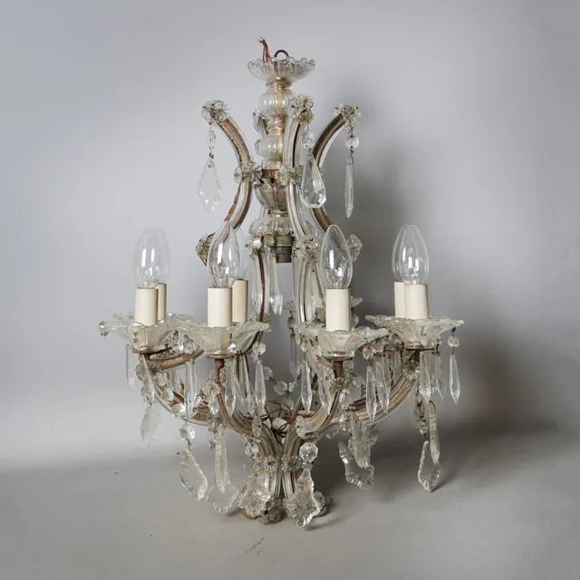 A CUT GLASS CHANDELIER.
