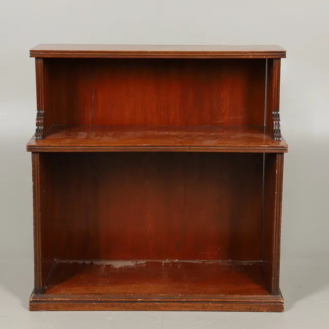 A SET OF 19TH CENTURY MAHOGANY WATERFALL BOOKSHELVES.