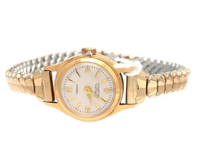 Tärnan 18K, damur, 18mm, manuell, öppningsbart flexiarmband, spricka i glas