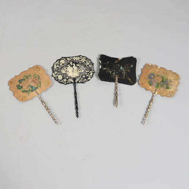 FOUR VICTORIAN PAPER MACHE FACE SCREENS.