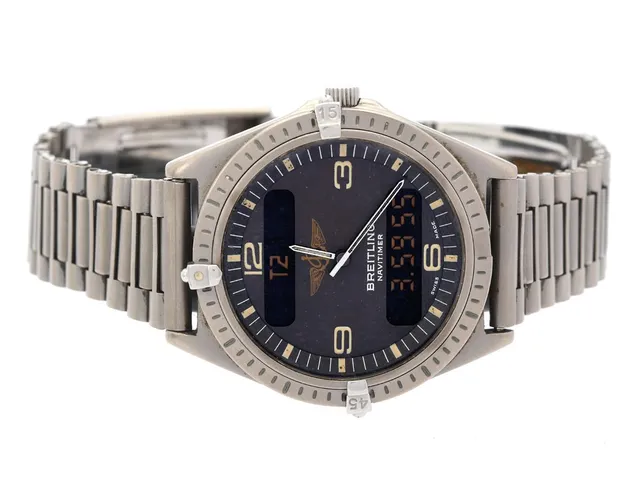 BREITLING, Aerospace, Serie nr. 27956, Ref nr. E56059, herrur, 40 mm, titan, quartz, mineralglas, analog/digital, skadad urtavla/visare, defekt (går ej, akut servicebehov), raider "30" saknas, Aerospacelänk, viklås (defekt, se fördjupd info), ca 1992.