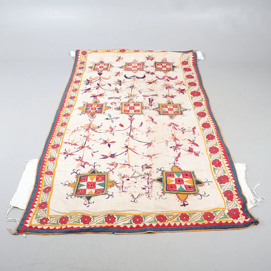 A SUZANI EMBROIDERED PANEL. — Textiles — Lawrences Auctioneers