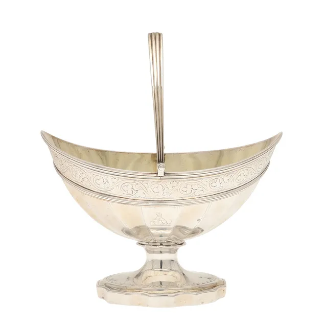 A GEORGE III SILVER SWING HANDLED PEDESTAL BOWL.