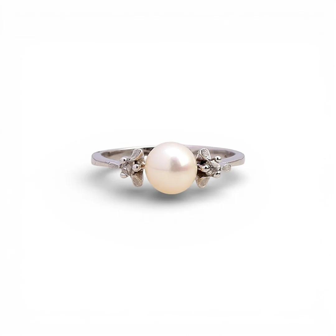 Pearl and diamond triplet ring. — Rings — Balclis