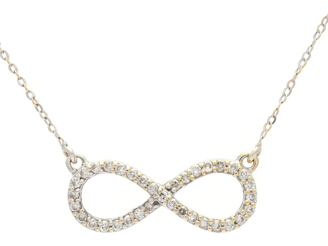 COLLIER, 18K vitguld, 35 briljantslipade diamanter ca 0,18 ctv, längd 42 cm, vikt 1,6 g. — Smycken/Collier — Kaplans