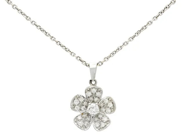 HÄNGE/KEDJA, 18K vitguld, 26 briljantslipade diamanter 0,65 ctv, ca W/VS-SI, blomma, längd 35 cm, vikt 6 g.
