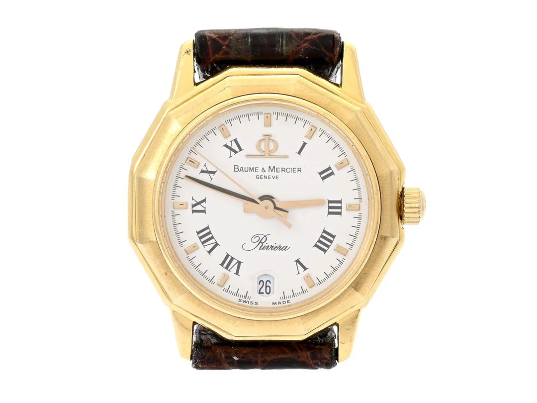 BAUME & MERCIER, Geneve, Riviera, Cal BM 8295, Boett nr. 83212.1 / 1982803, damur, 25 mm, 18K guld, quartz, safirglas (repor/nagg), datum, skadad urtavla, läderband, originalspänne i doublé, ca 1995. — Klockor/Baume&Mer — Kaplans