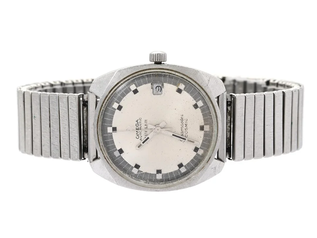 OMEGA, Seamaster, Comsic (-T Swiss Made T-), "Türler", Cal 565, Serie nr. 26932153, Ref nr. ST 166.022, Boett nr. 166.022, herrur, 33,5 mm, stål, automatisk, plexiglas, datum, skadad urtavla, servicebehov, skadad krona/ställaxel, ca 1968, metallänk ej original. — Klockor/Omega — Kaplans