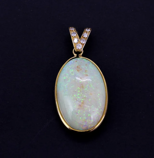 LARGE OPAL AND DIAMOND PENDANT.