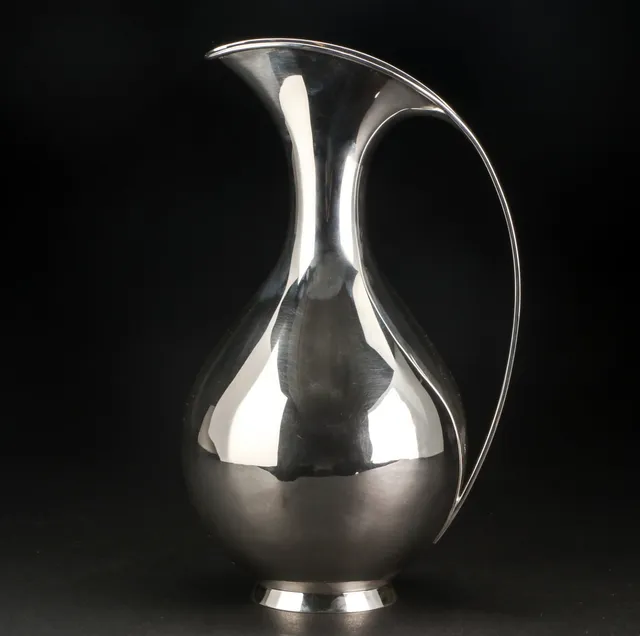 Kay Fisker for A. Michelsen. Beaked pitcher in sterling silver